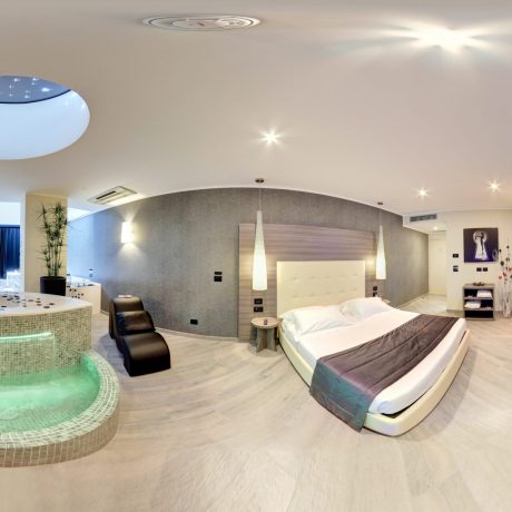 360 degree panorama of expensive hotel suite with tiled fountain and modern furniture